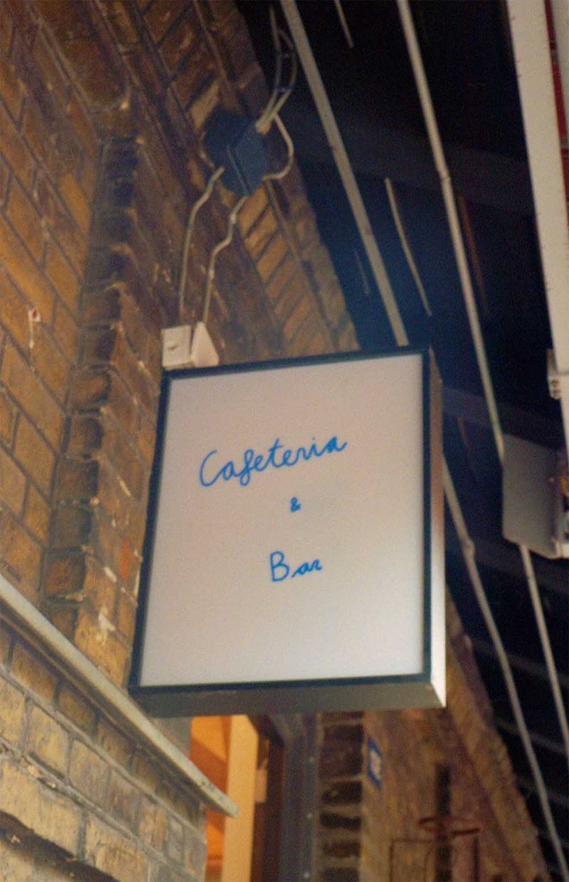 Outside Alle Tides - Light sign with logo